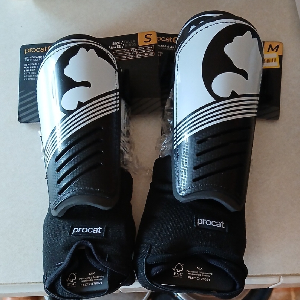 Puma Kids' Black and White Shin Guards (2 Pair.  1Sm And 1Med)